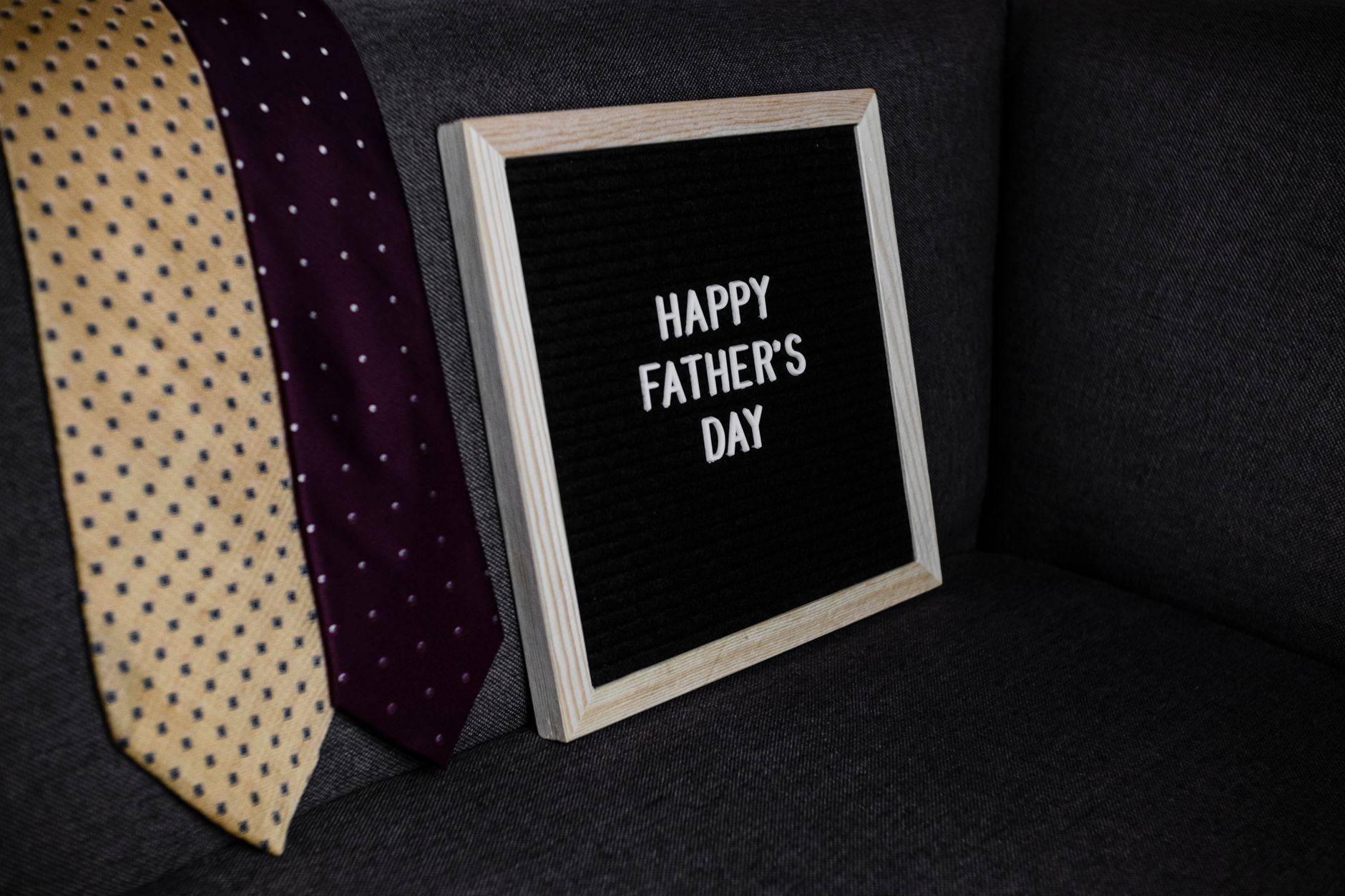 Celebrate Father's Day with a cozy setup featuring ties and a heartfelt message.
